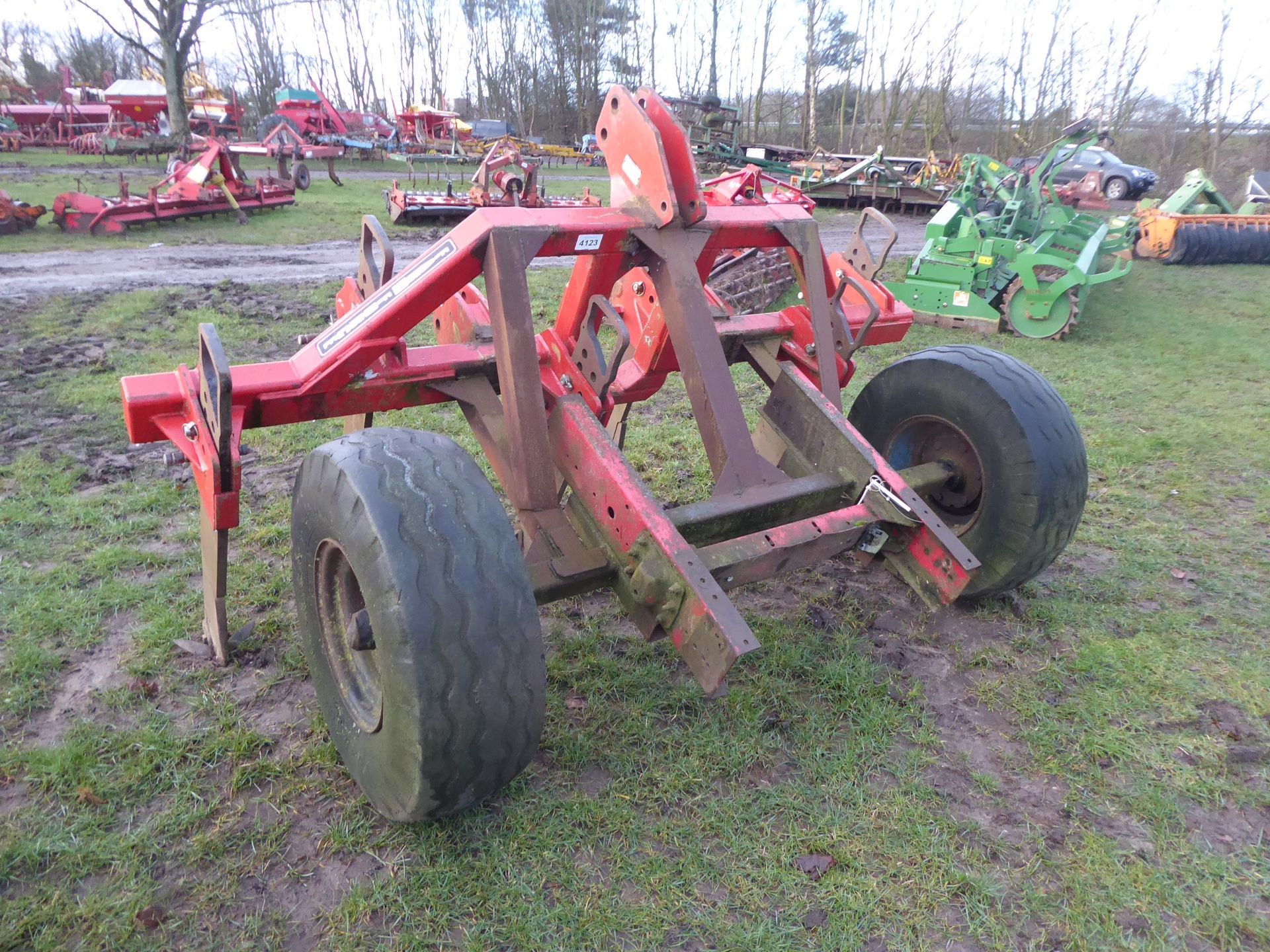 Front linkage 5 leg sub soiler with depth wheels