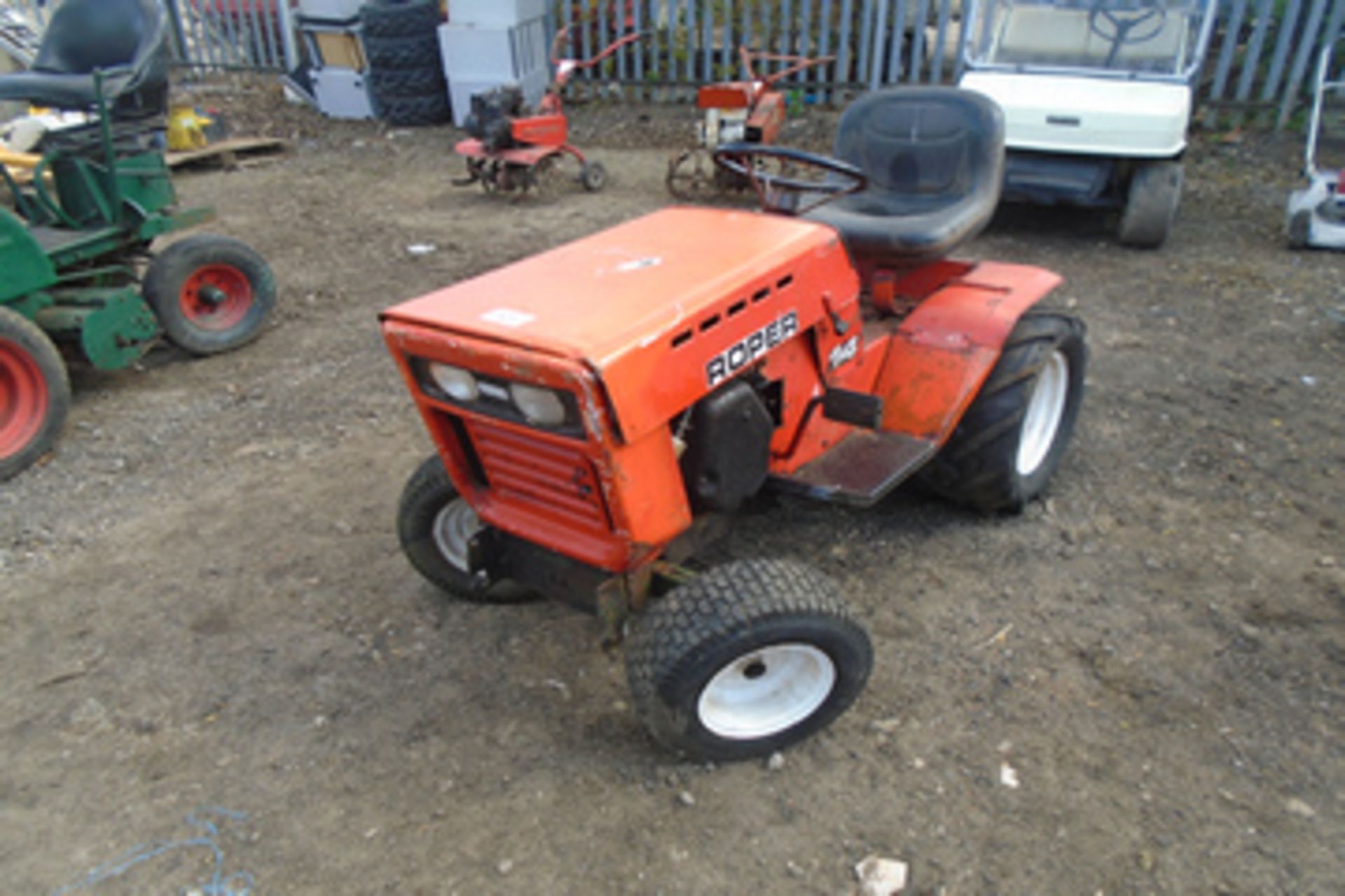 Roper 14 mini tractor with grass cutter and snow plough attachments