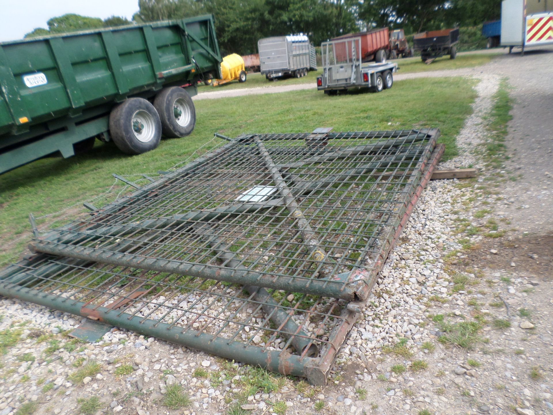 Large pair of heavy duty steel gates, each one 12'x9'