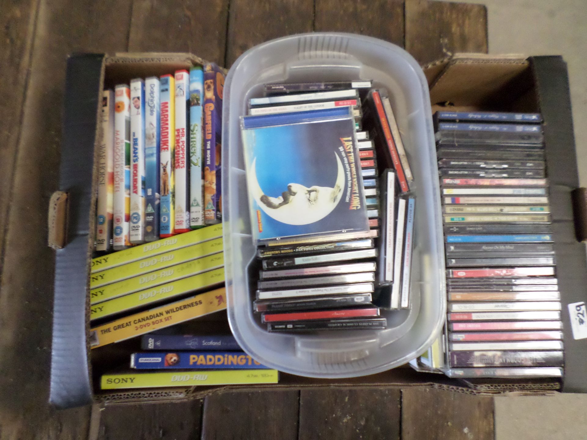 Box of CDs and DVDs