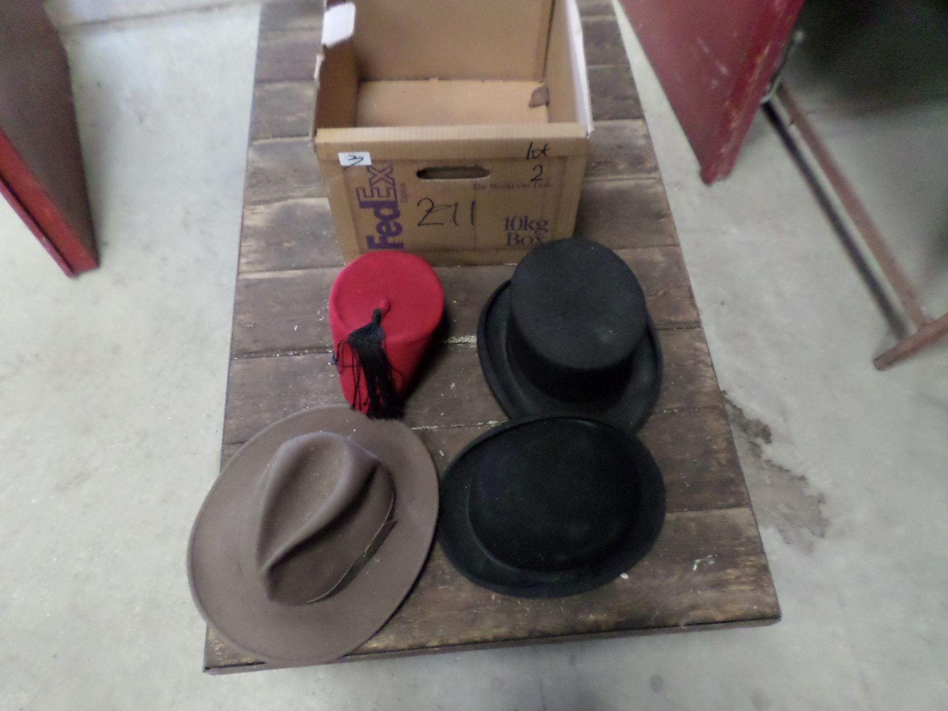 Box of bowler hats, top hat etc