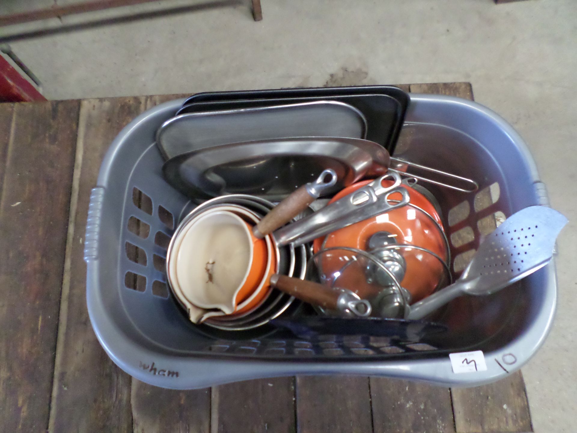 Box of kitchen pans including Le Creuset