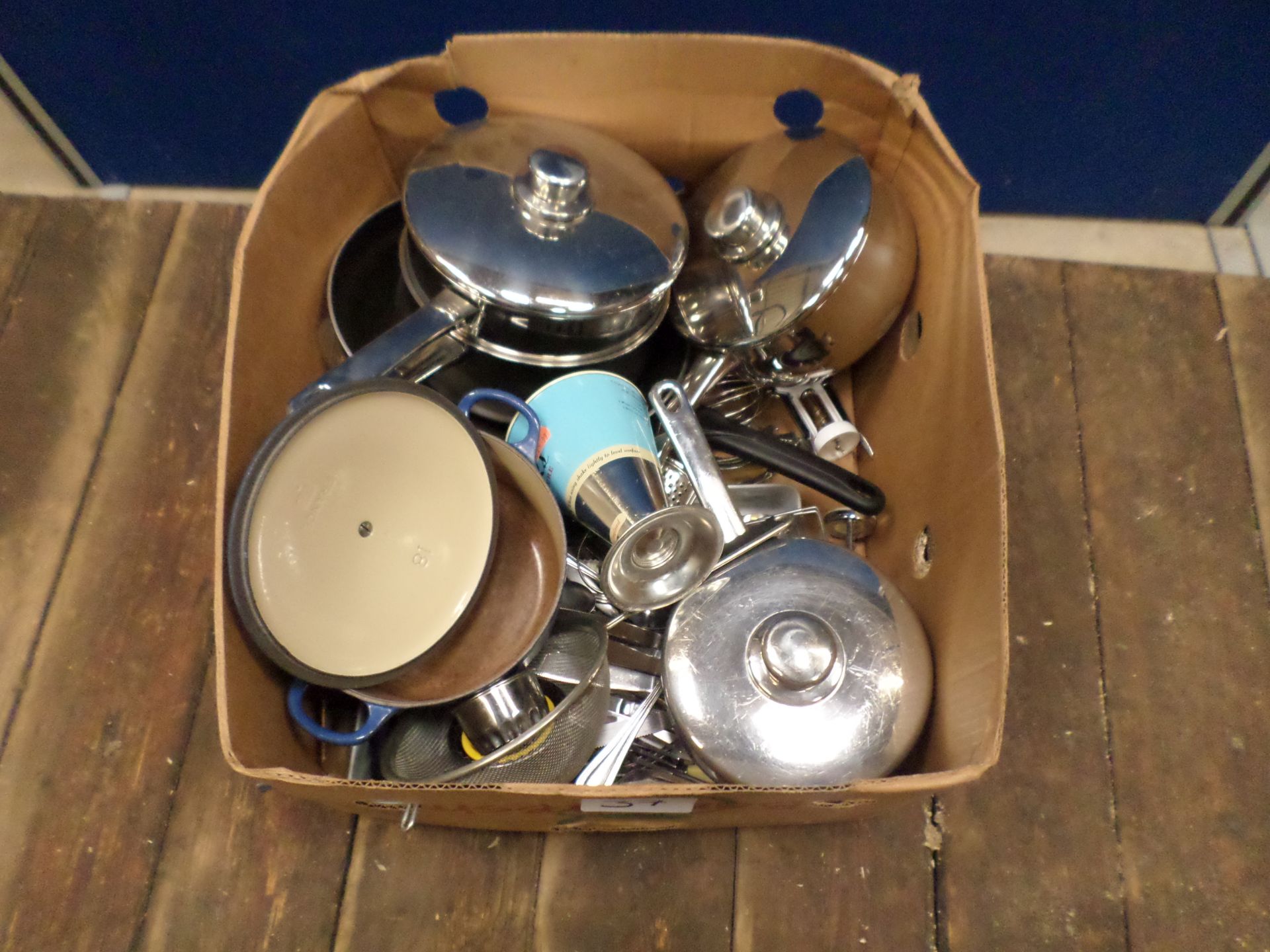 Box of kitchen pans and cutlery