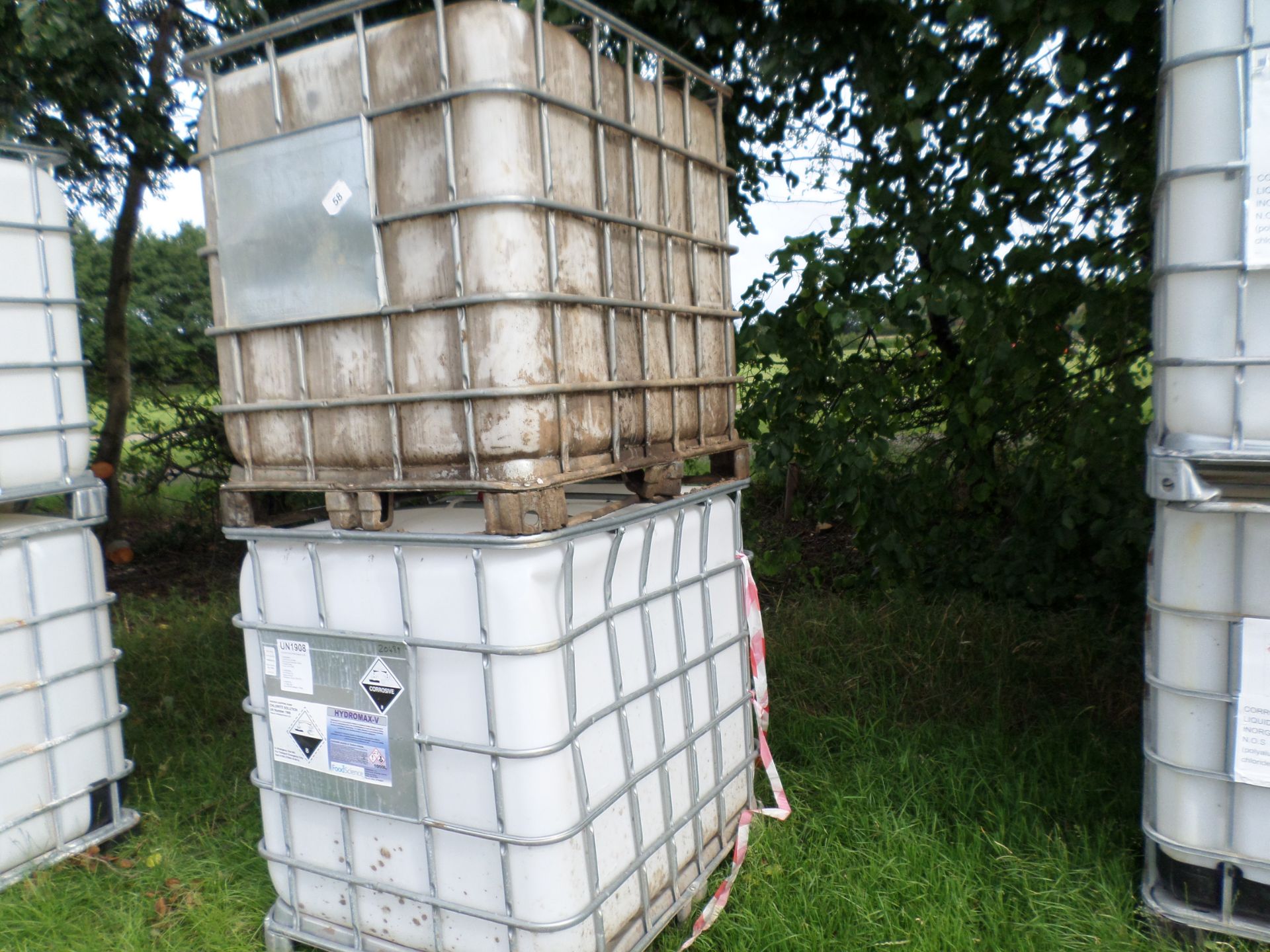 2 x plastic IBCs in metal frame