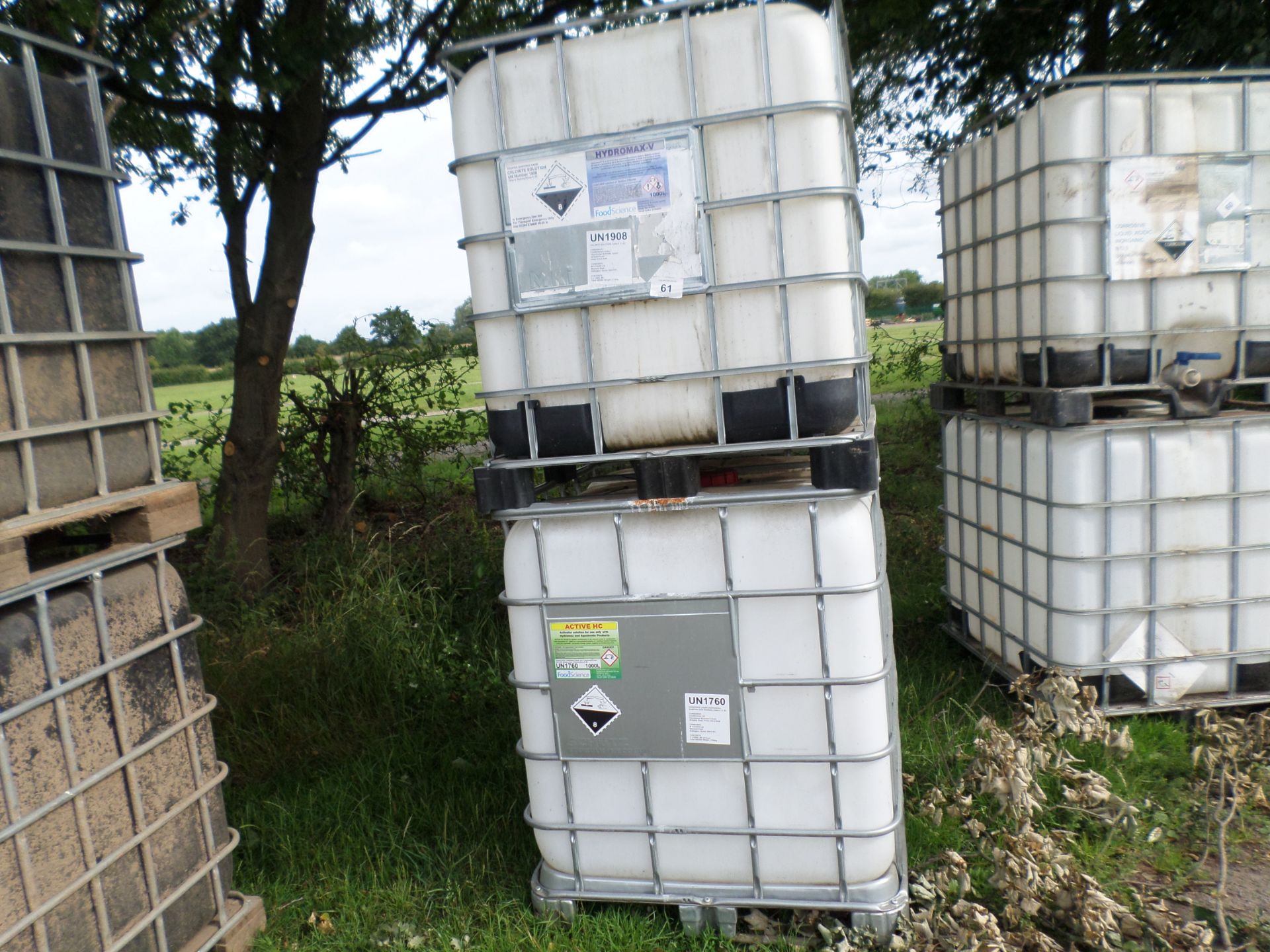 2 x plastic IBCs in metal frame