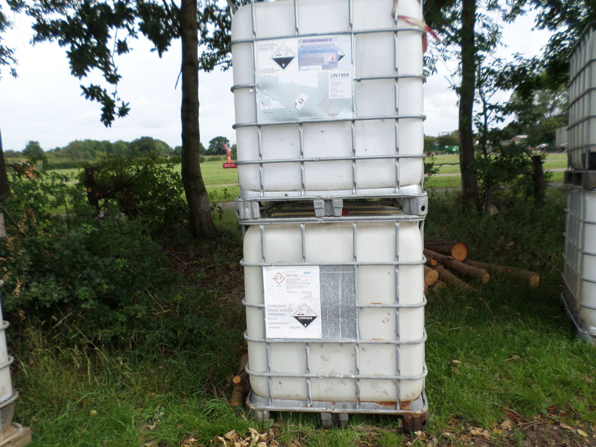 2 x plastic IBCs in metal frame