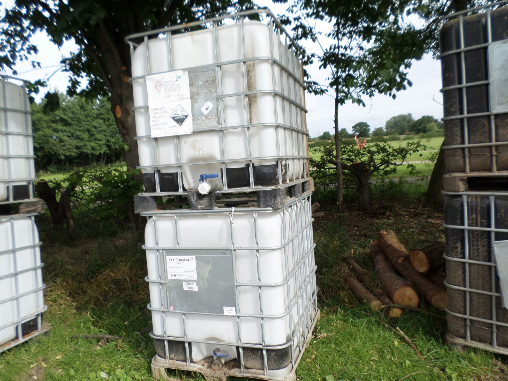 2 x plastic IBCs in metal frame