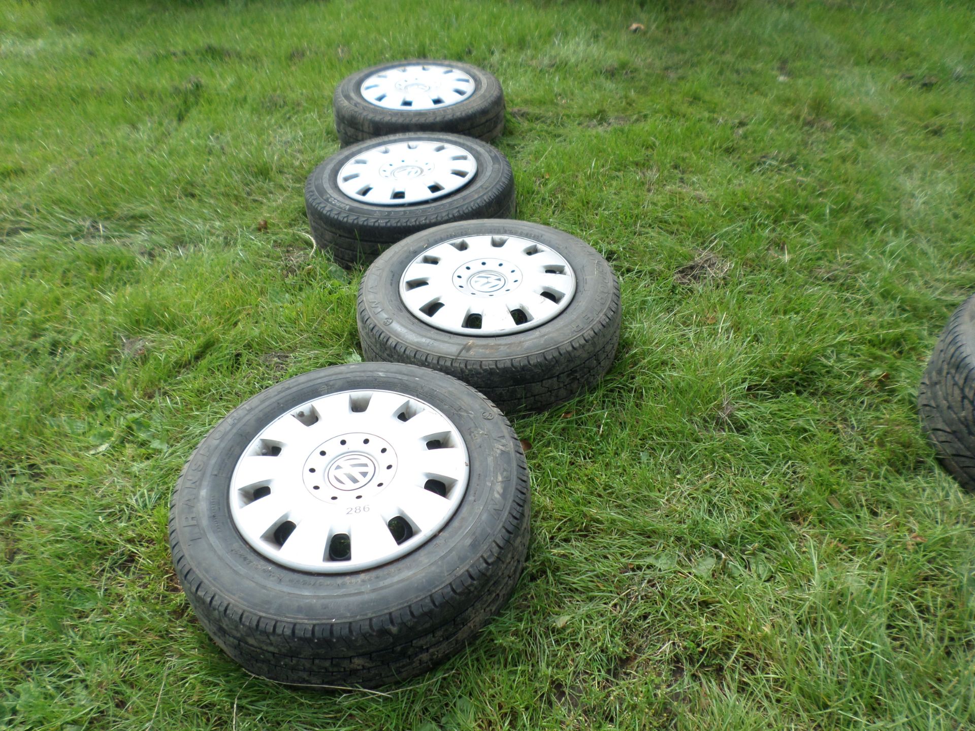 4 wheels/tyres to fit VW Transporter van, c/w VW trims (sound) NO VAT