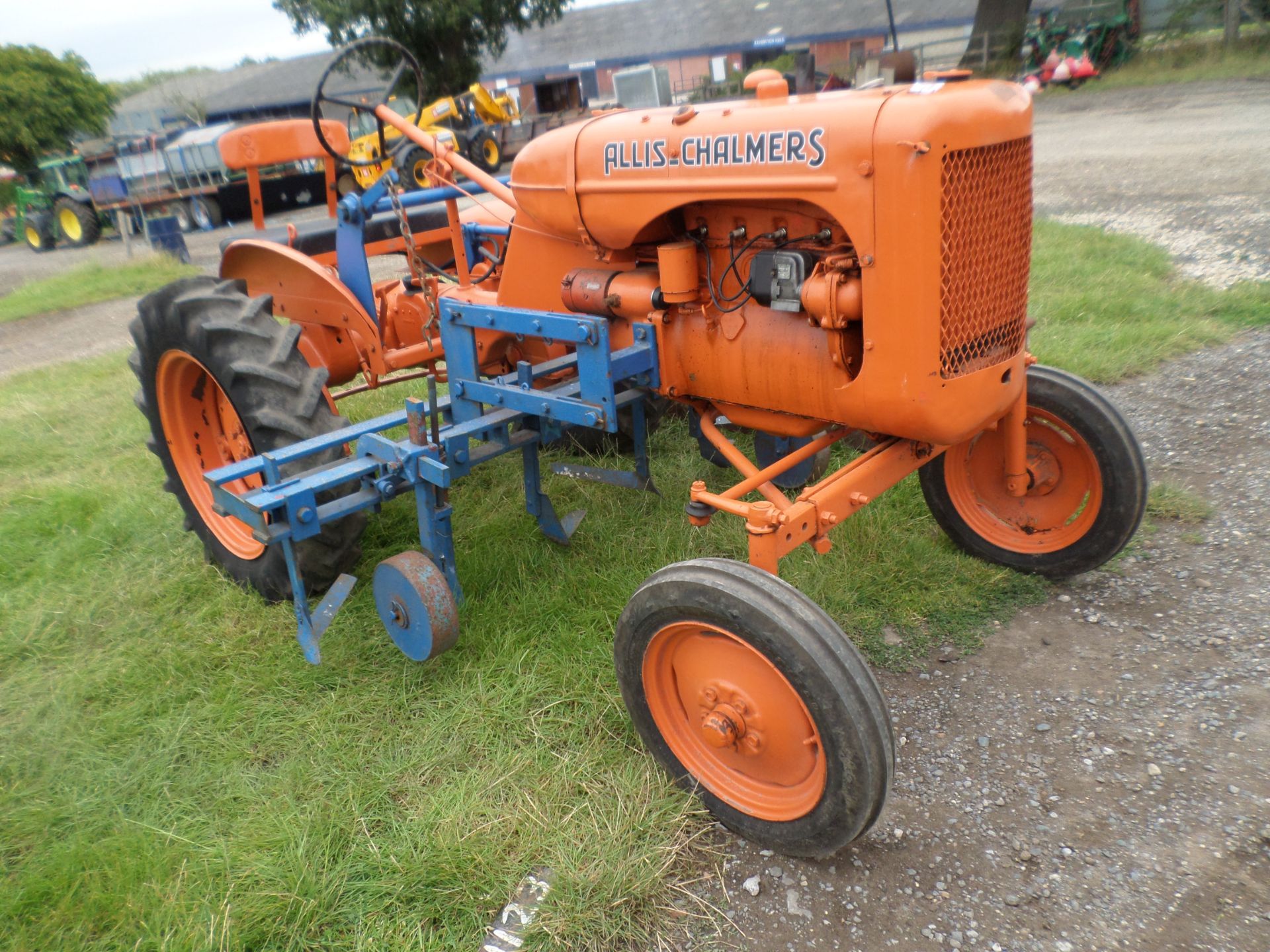 Alice Chalmers 1930s tractor c/w lift up cultivator, electric start or starting handle (needs