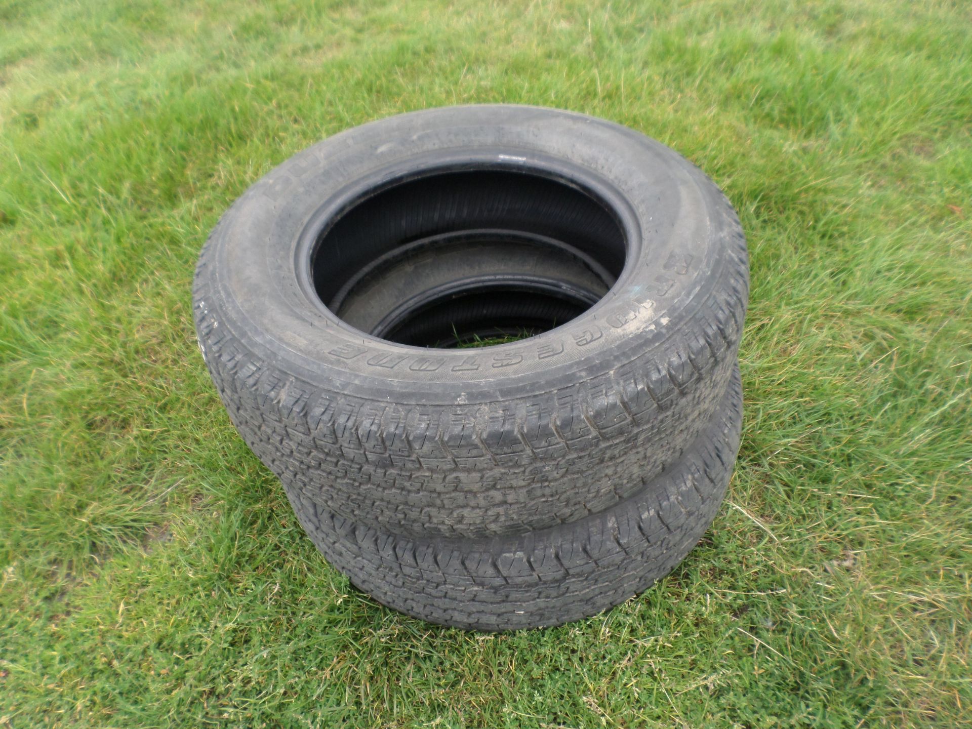 2 Bridgestone Dueler HT 255/65/17 110S. Good condition, lots of tread, swapped for off-road tyres