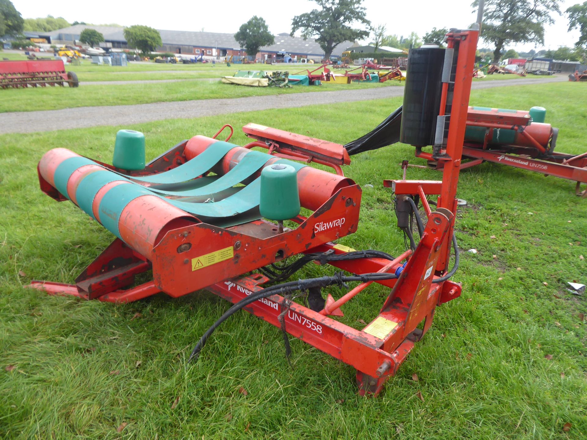 Kverneland UN 7558 static bale wrapper with electric controls and remote kit, used this season