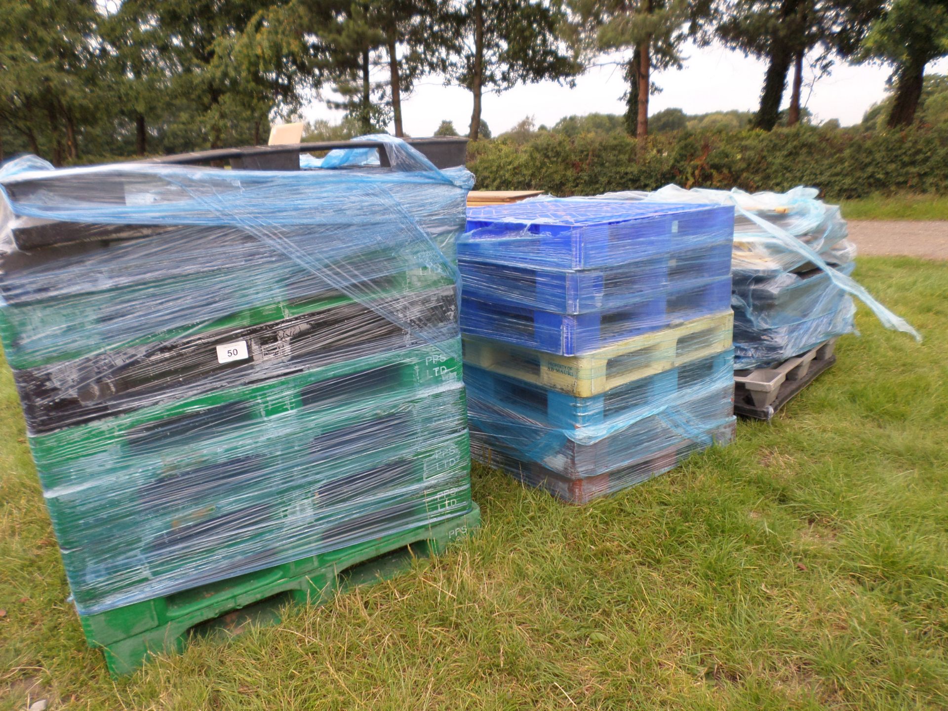 Quantity of plastic pallets