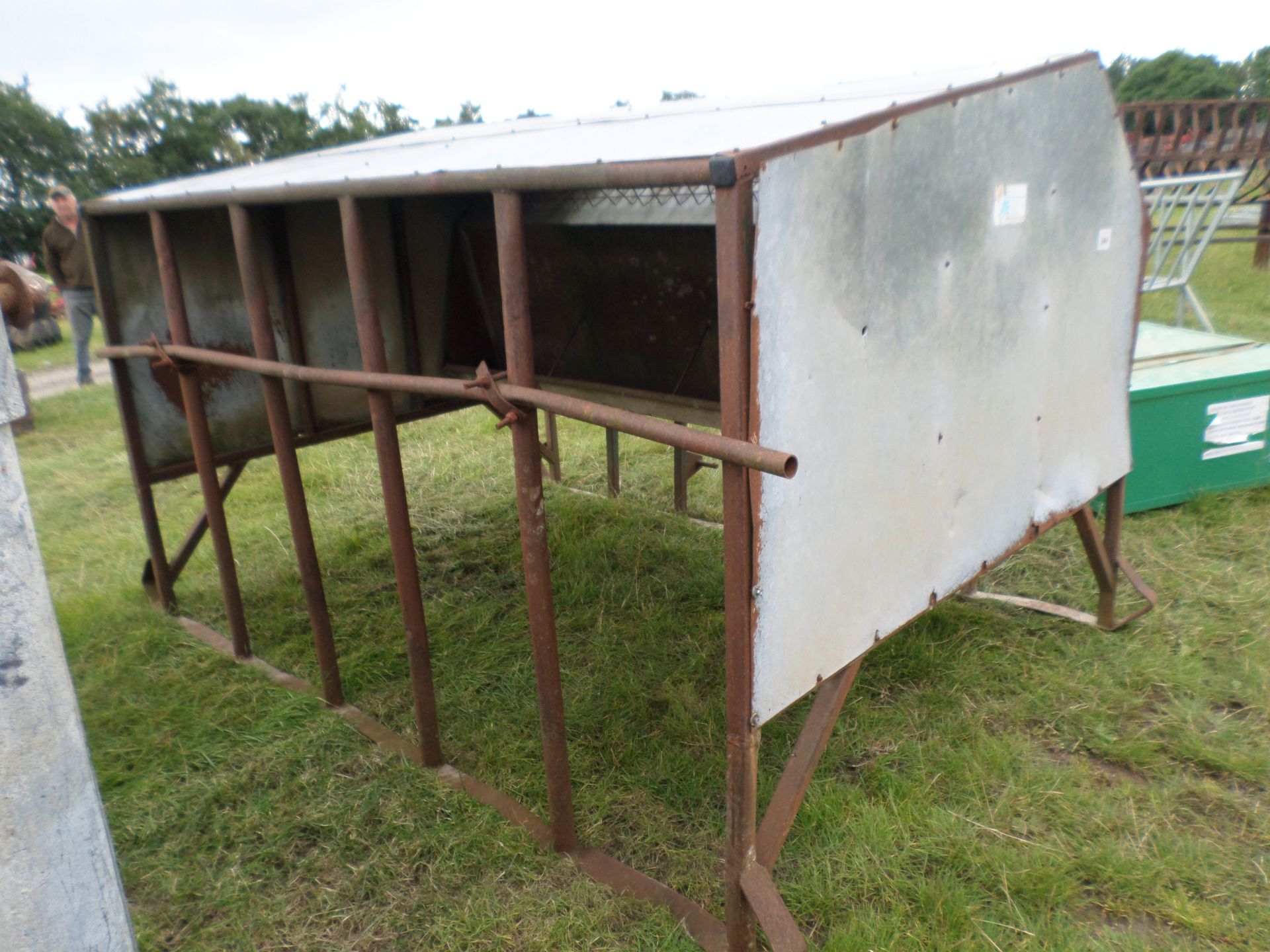 Trough and cattle feed barrier