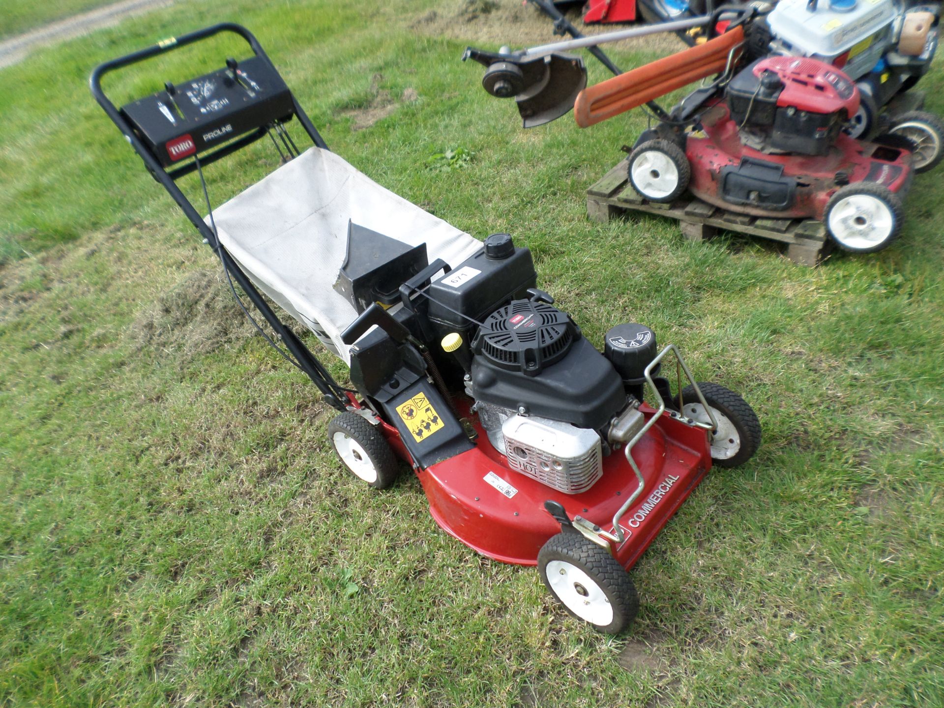 Toro Pro Line commercial self propelled 3 speed rotary mower with mulching plug and grass bag