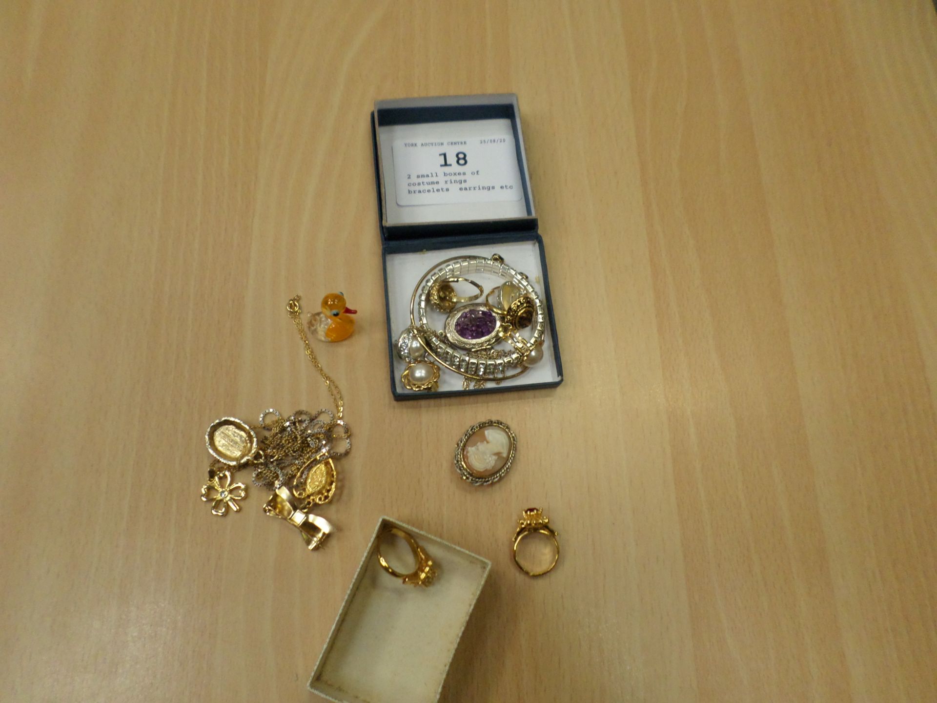 2 small boxes of costume rings, bracelets, earrings etc