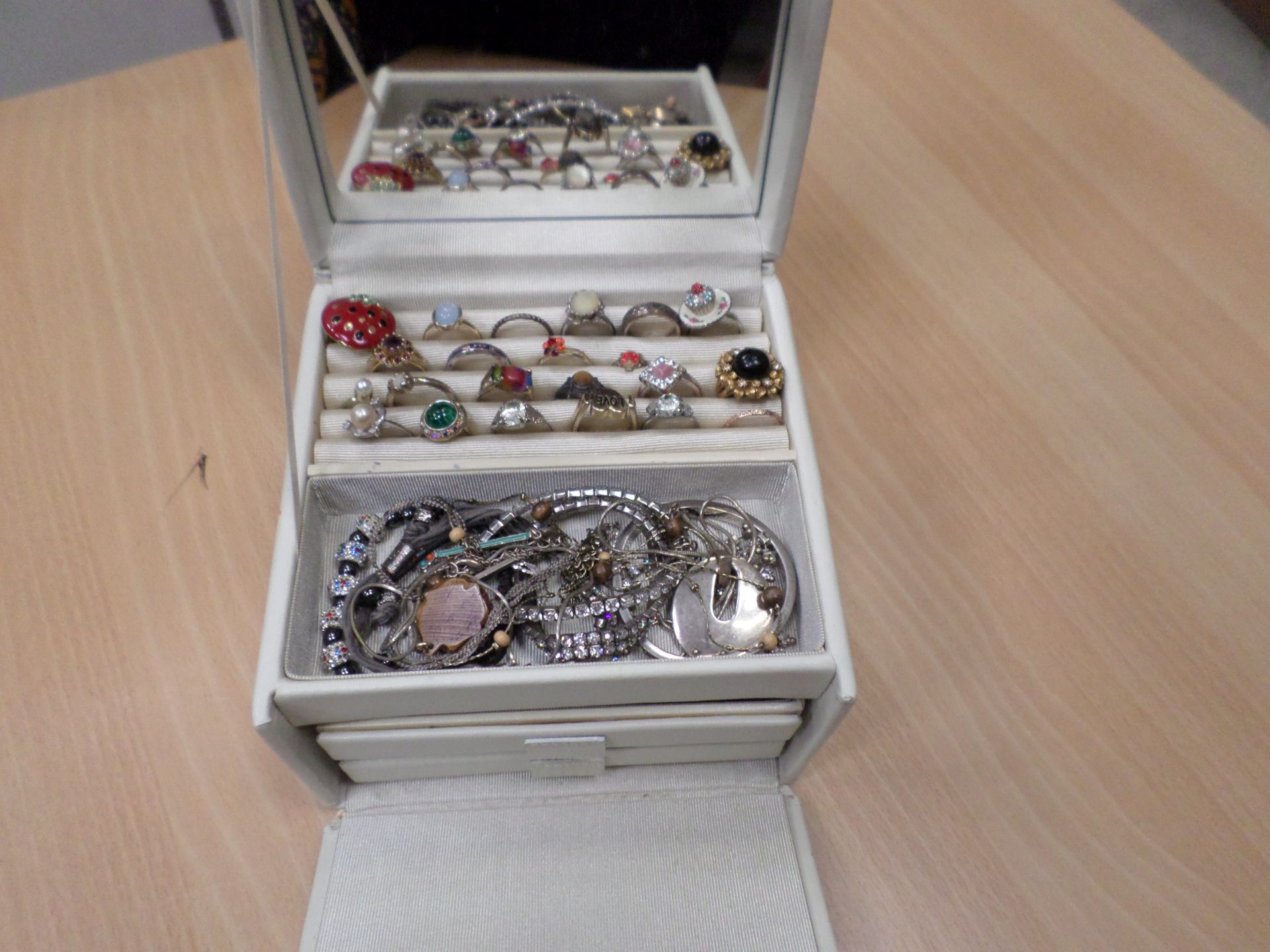 Carry case full of costume jewellery