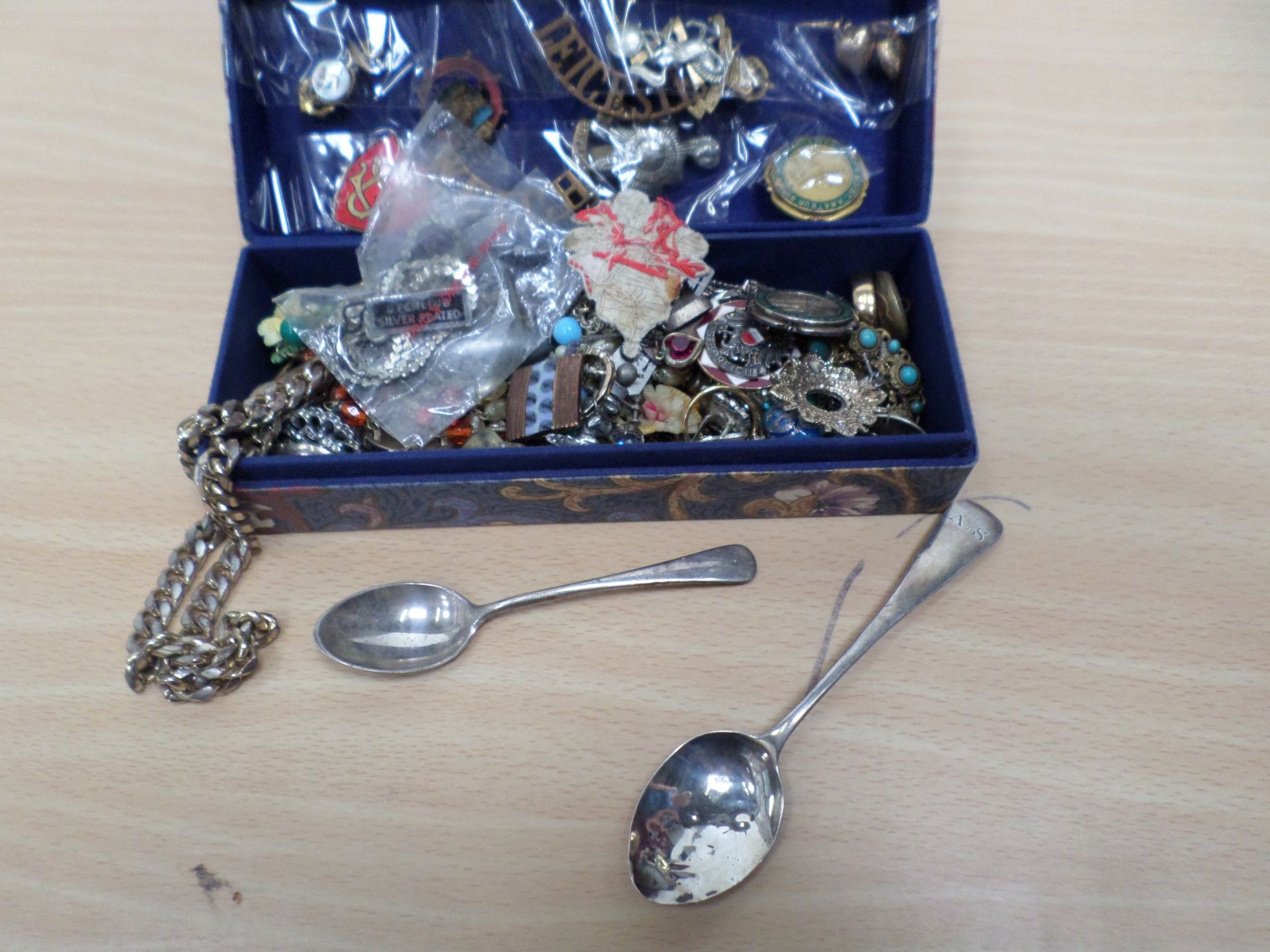 Box of costume jewellery and military badges