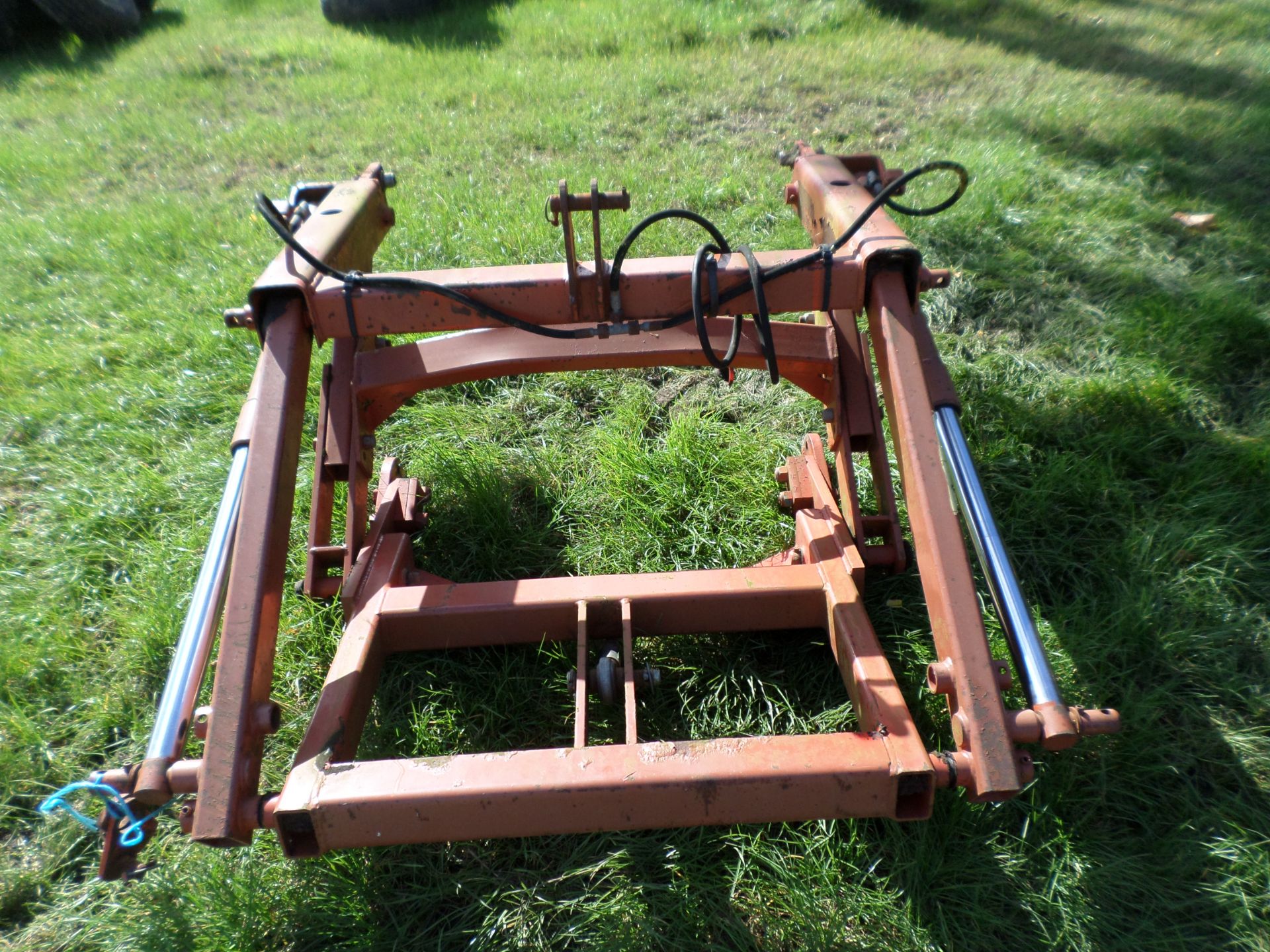 Kuhn lift rack linkage