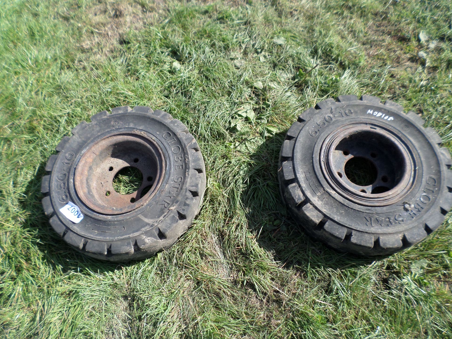 2 5-stud nearly new forklift wheels 6.5/10