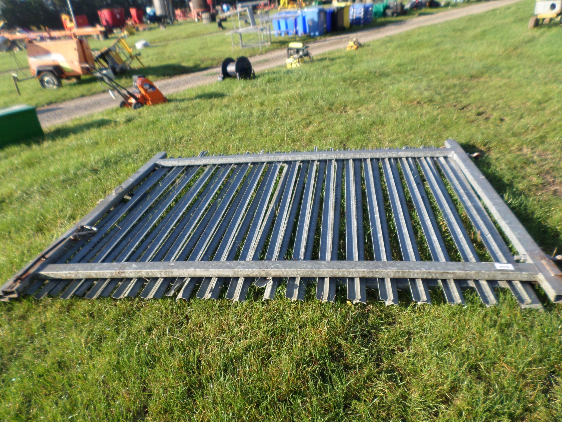 2 galvanised security gates, 9'6" high x 7'7' high