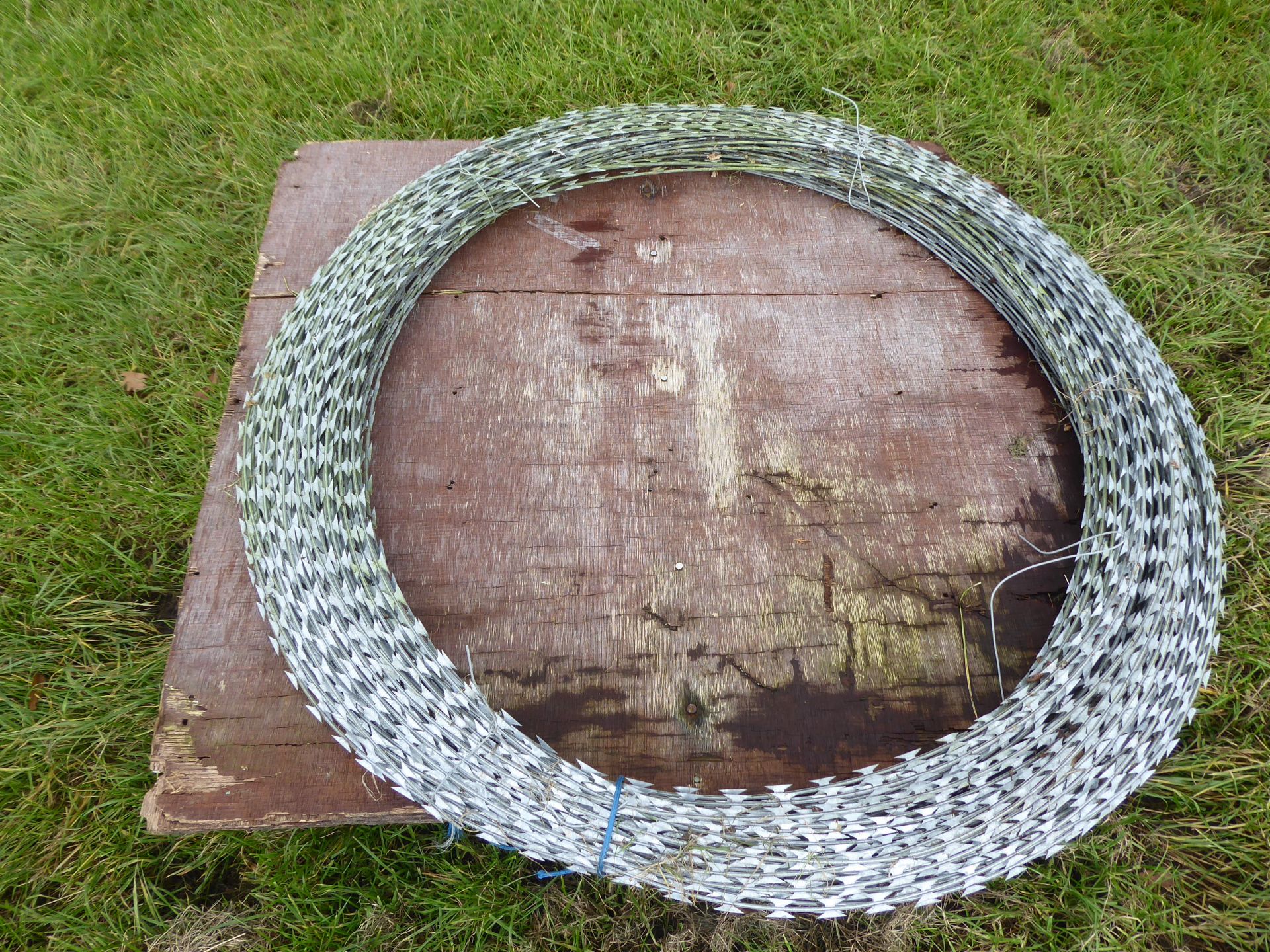 Large unused coil of razor wire NO VAT