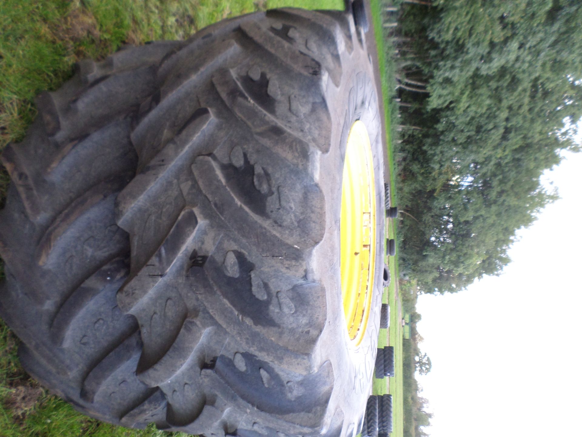 Pair of Goodyear 650/85/38 tyres on JD rims, 50\% - Image 2 of 3