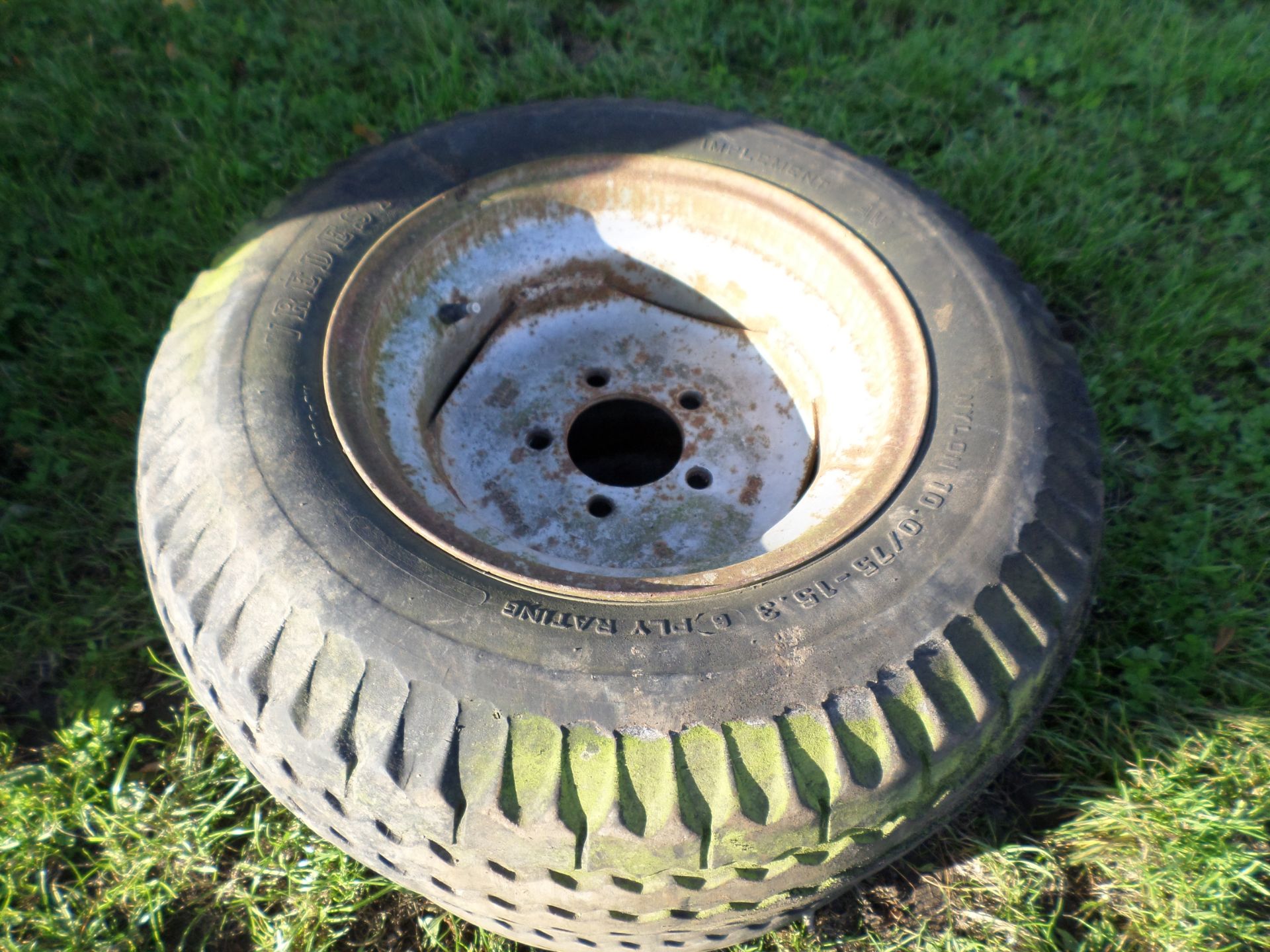 Pair of tyres and rims 10.0/75-15.3