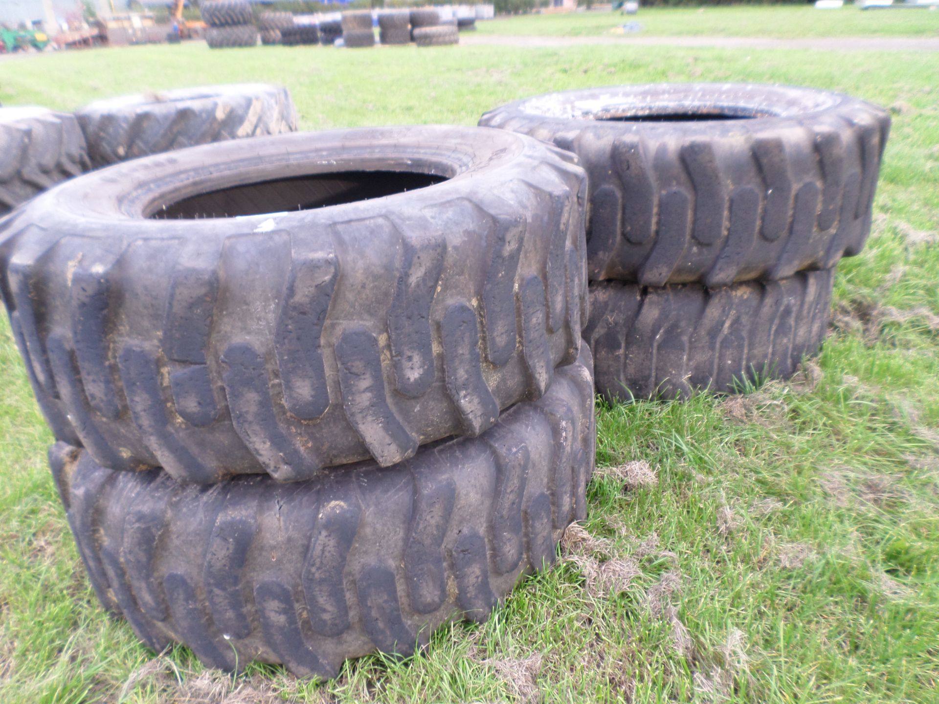 4 telehandler tyres 15.5/25 BKT GR 288 12ply. 2 at 50\%, 1 at 20\%, 1 at 5\%