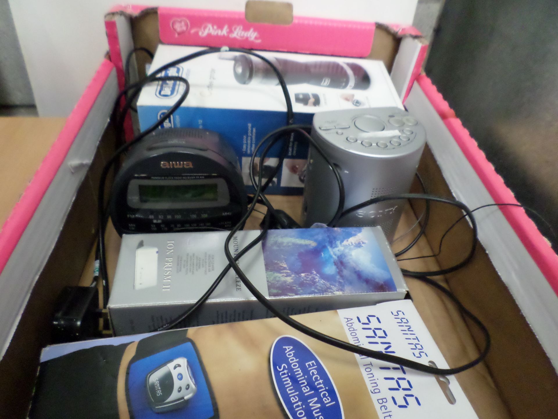 Box of small electricals including coffee grinder, ION air cleaner, abdominal toning belt and 2