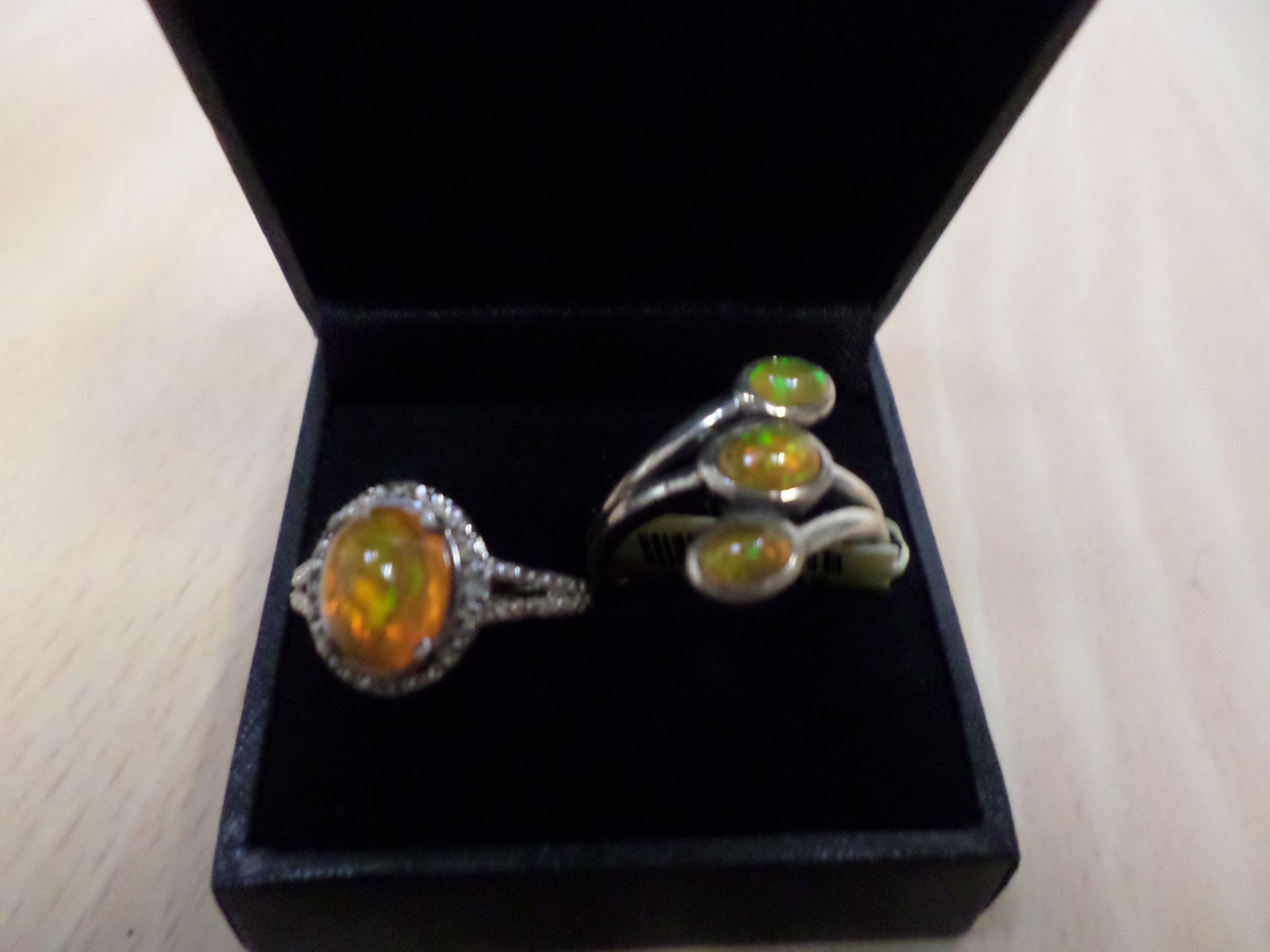 2 hallmarked silver fire opal rings