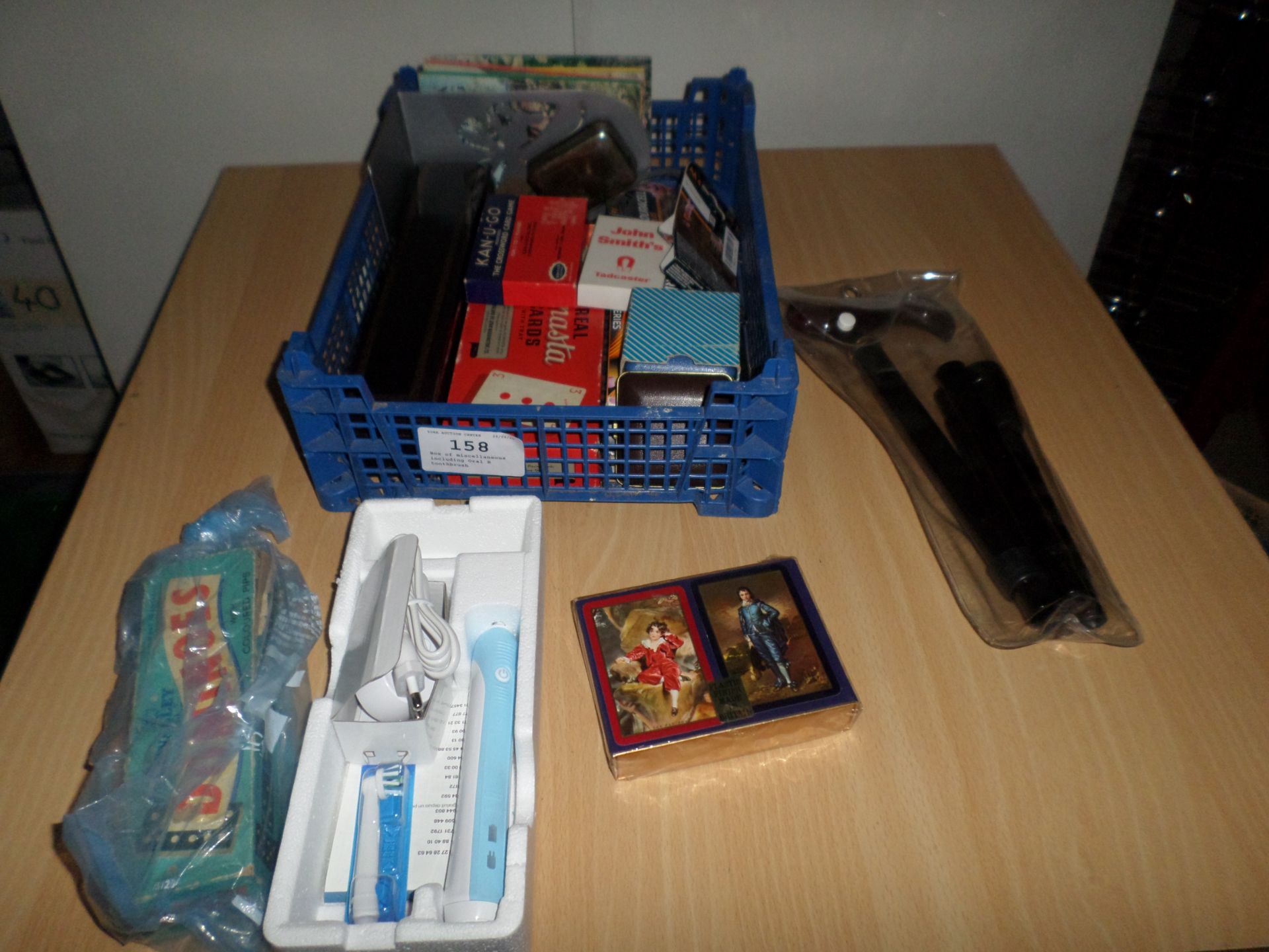 Box of miscellaneous including Oral B toothbrush
