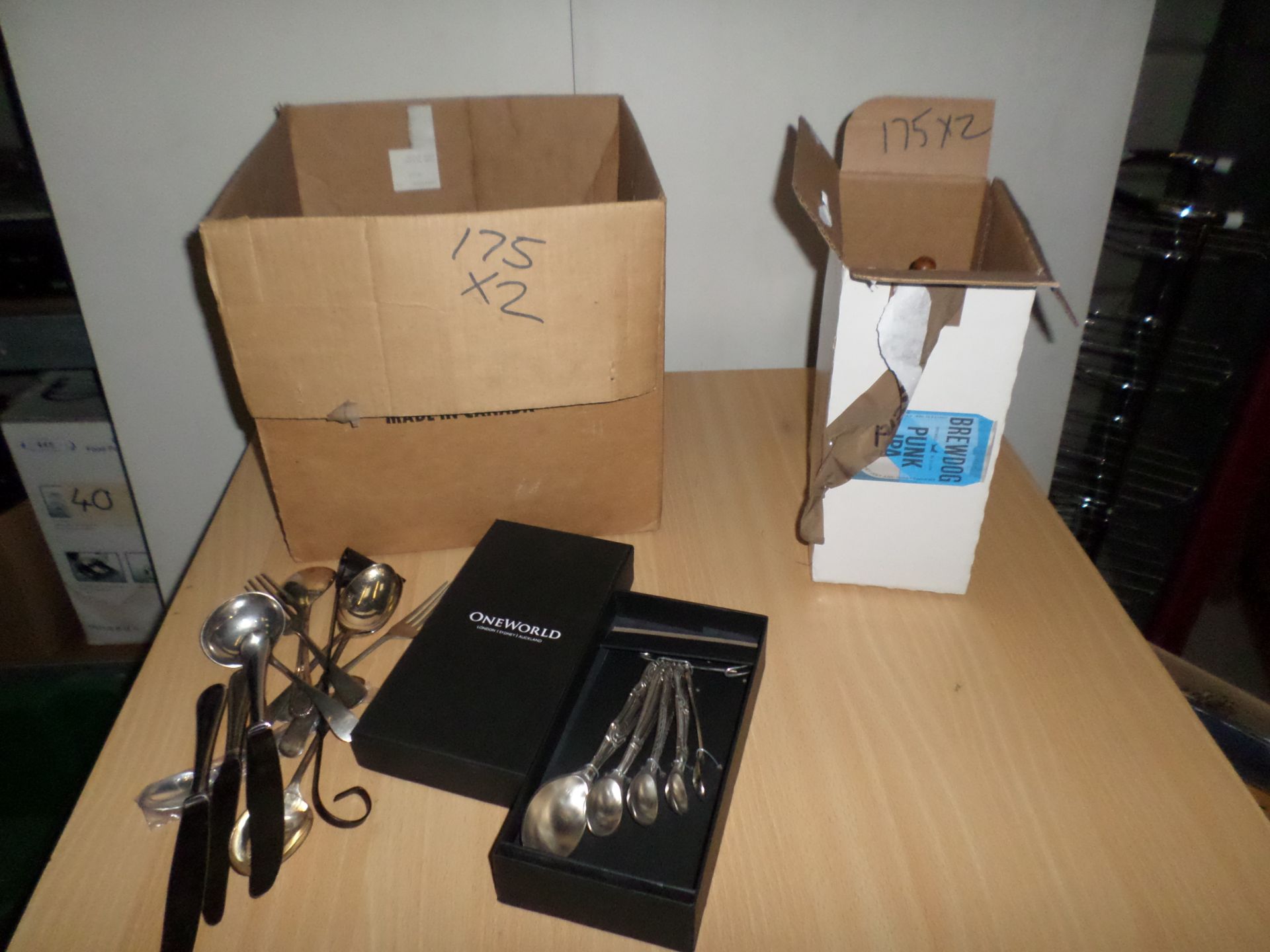 Box of cutlery, box of glass jugs, bottles etc