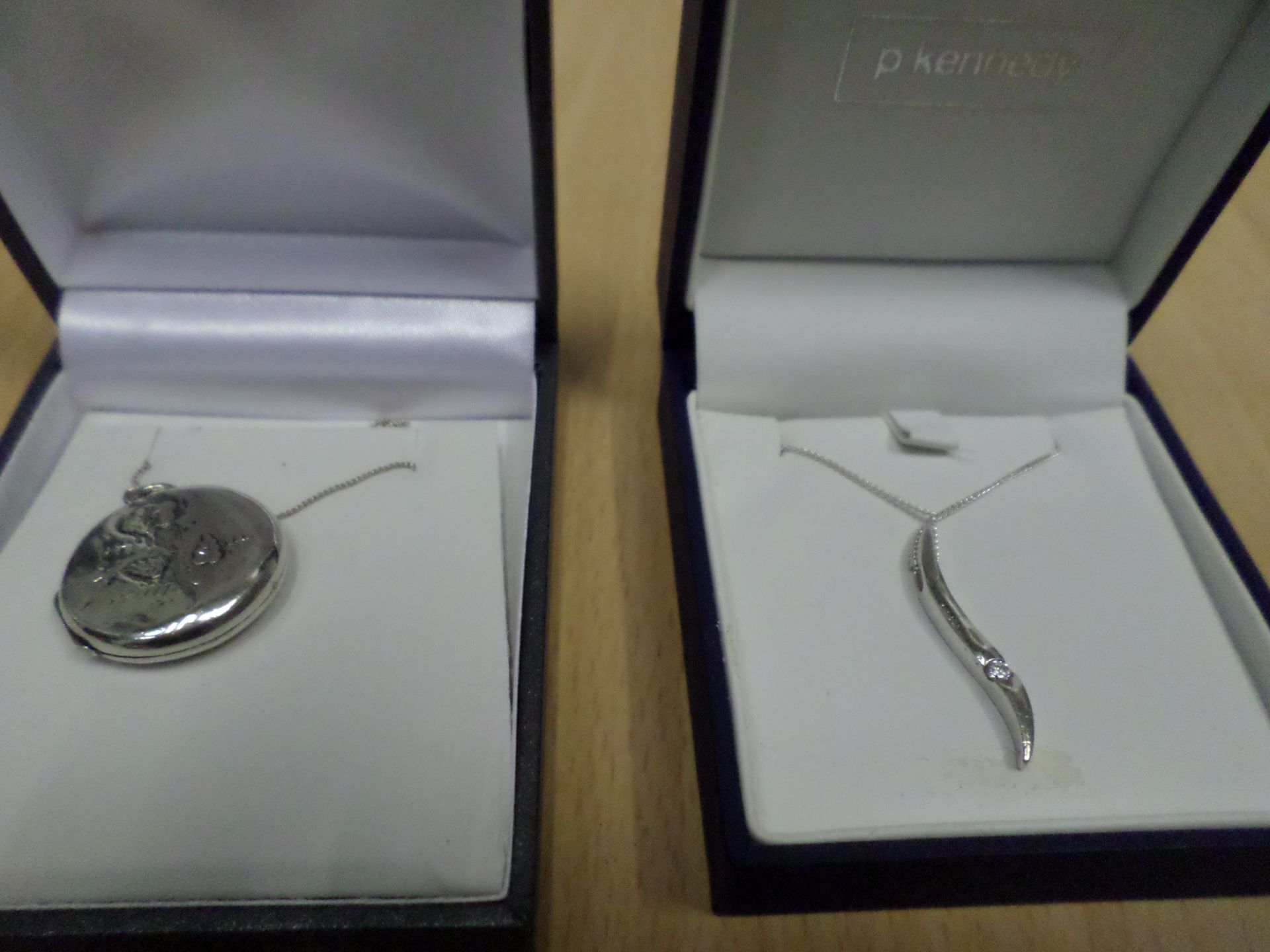 Hallmarked silver locket and hallmarked silver pendant