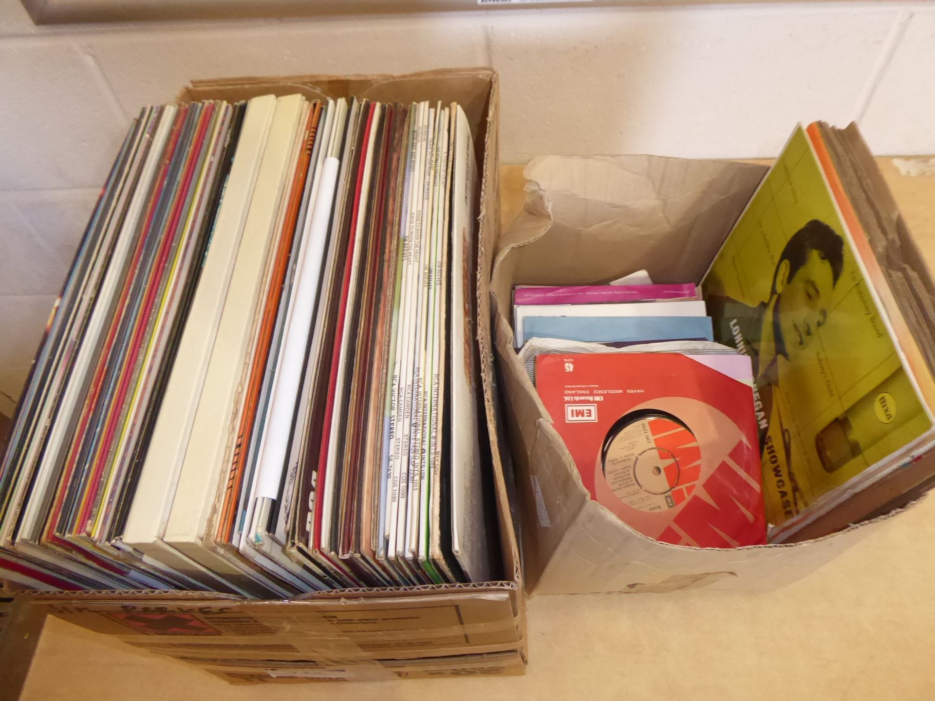 2 boxes of vinyl records
