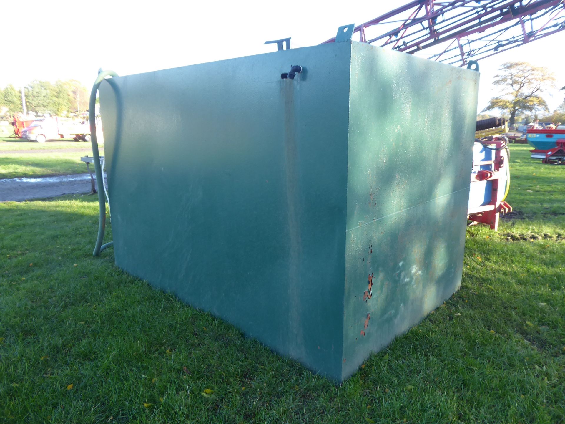 Large green sprayer water tank