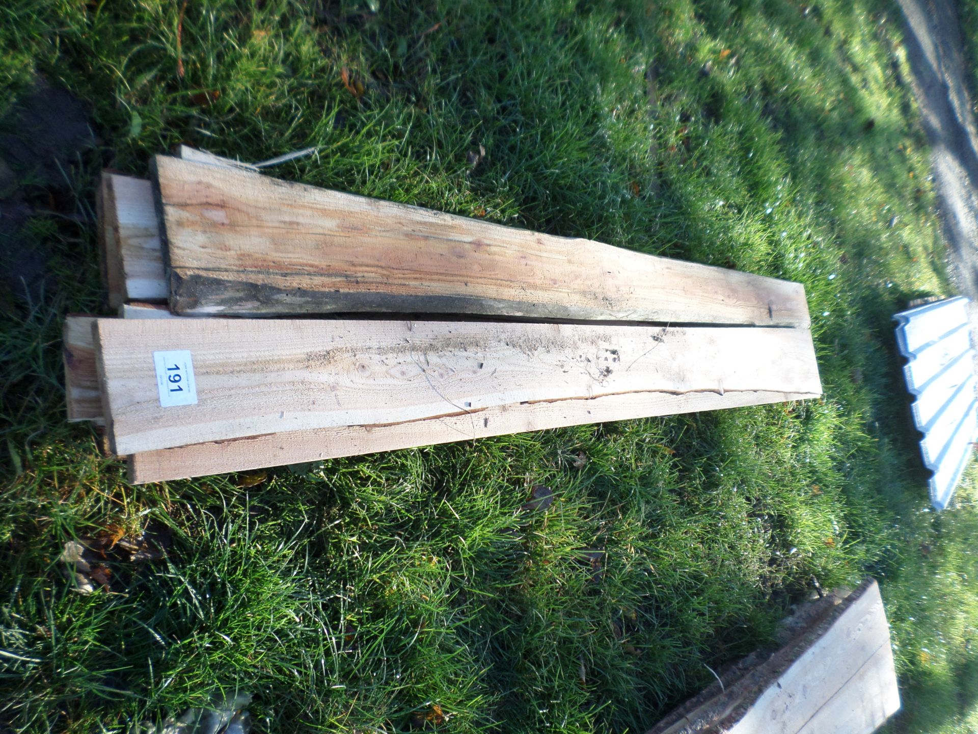 Quantity of rough cut softwood boards