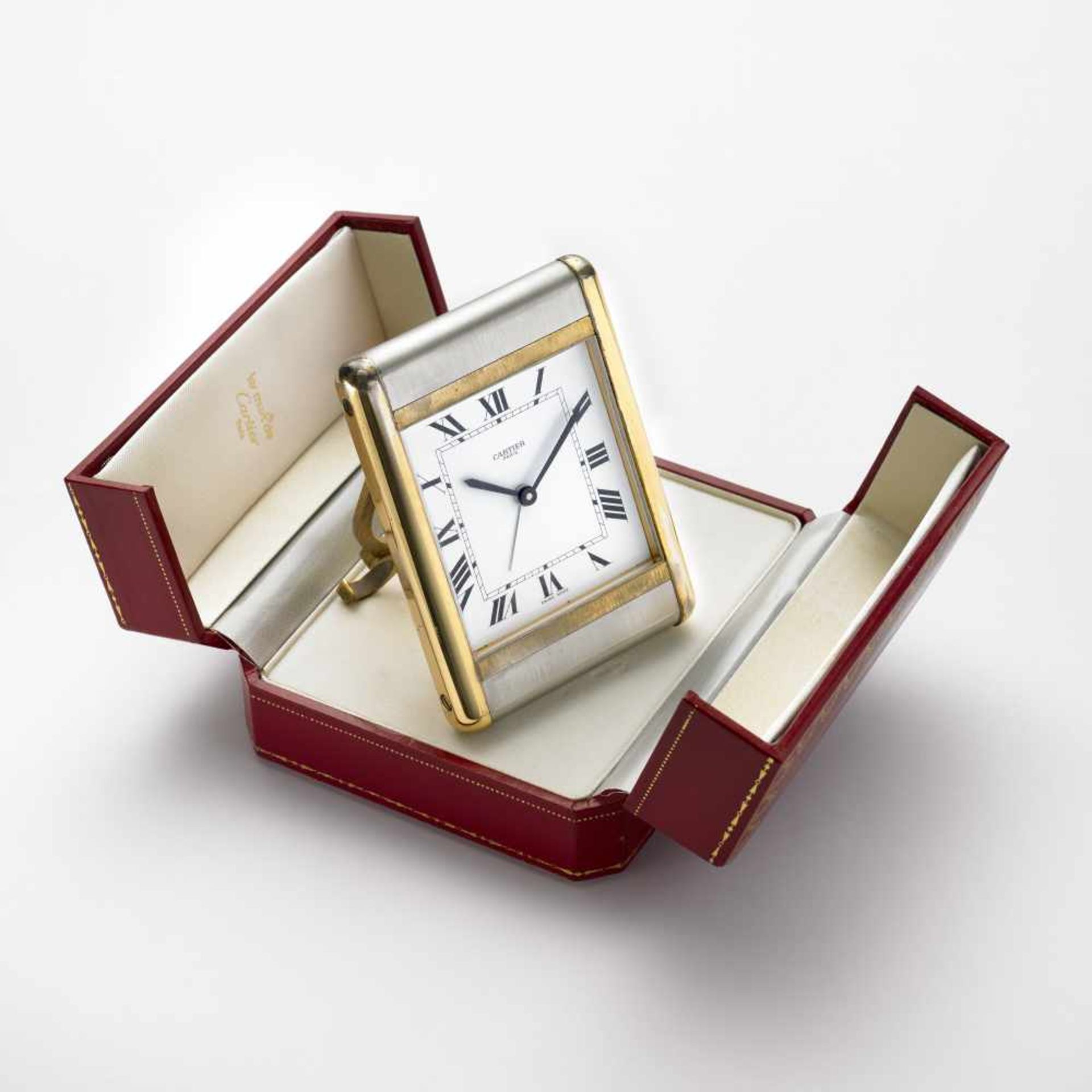 CARTIERGilt travel clock1980sDial, movement and case signedQuartz movementWhite dial with romanic