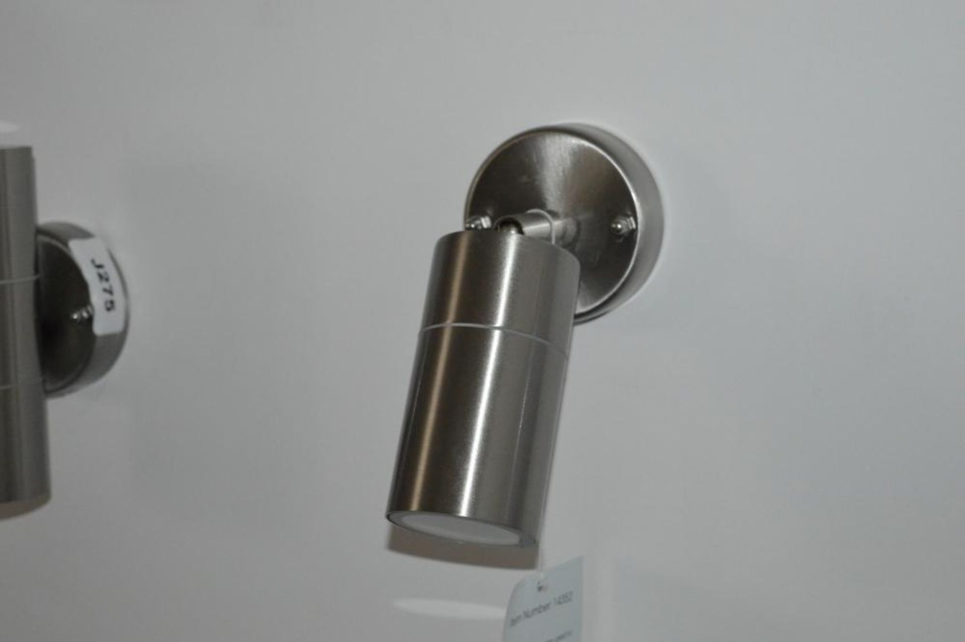 1 x Outdoor Directional Wall Light And A 2 Light Wall Bracket Finished In Stainless Steel - Ex Displ