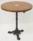 1 x Wooden Topped Table With An Ornate Metal Base - Dimensions: Height 74cm / Diameter 65cm -