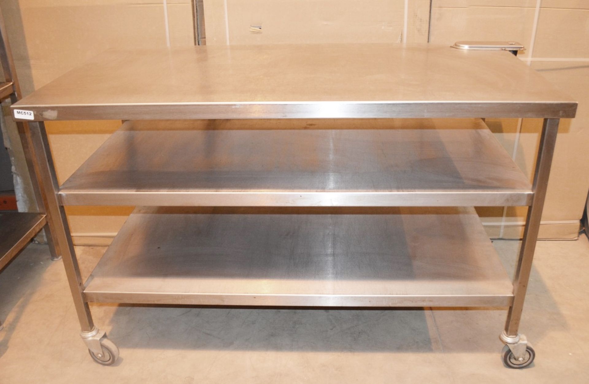 1 x Stainless Steel Commercial Kitchen 1.4 Metre Prep Table With Undershelves On Castors -