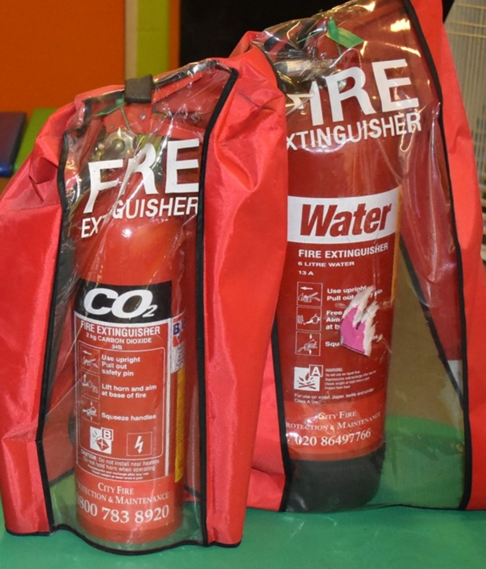 2 x Fire Extinguishers With Covers - Includes 6 Litre Water and 2kg Carbon Dioxide - CL520 -