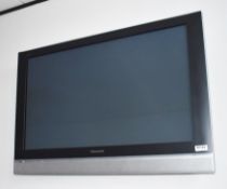 1 x Panasonic 32 Inch Television With Remote Control and Wall Mount Bracket - Previously Used in