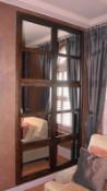 A Pair Of Built-In Bookcases With Mirrored Doors - Dimensions: W144 x H255 x 48cm *NO VAT ON HAMMER*