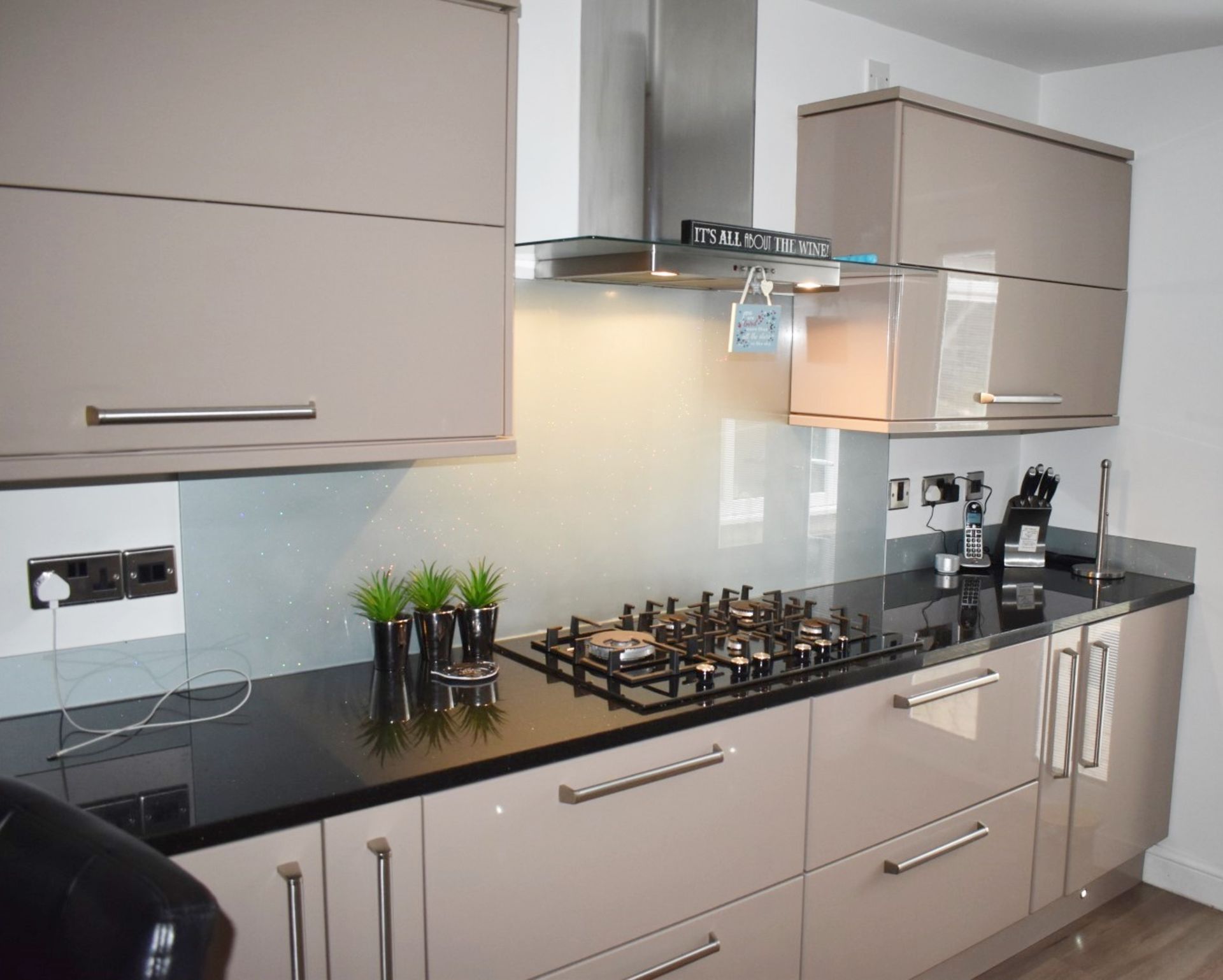 1 x Contemporary Mocha Fitted Kitchen Featuring Galaxy Granite Worktops, Breakfast Bar With Stools - Image 28 of 77