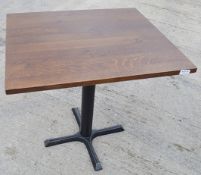 4 x Assorted Commercial Bar Tables  - All Feature A Robust Wooden Top With A Sturdy Metal Base