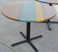 1 x Commercial 100cm Round Tables Featuring Abstract Paint Work And Metal Base