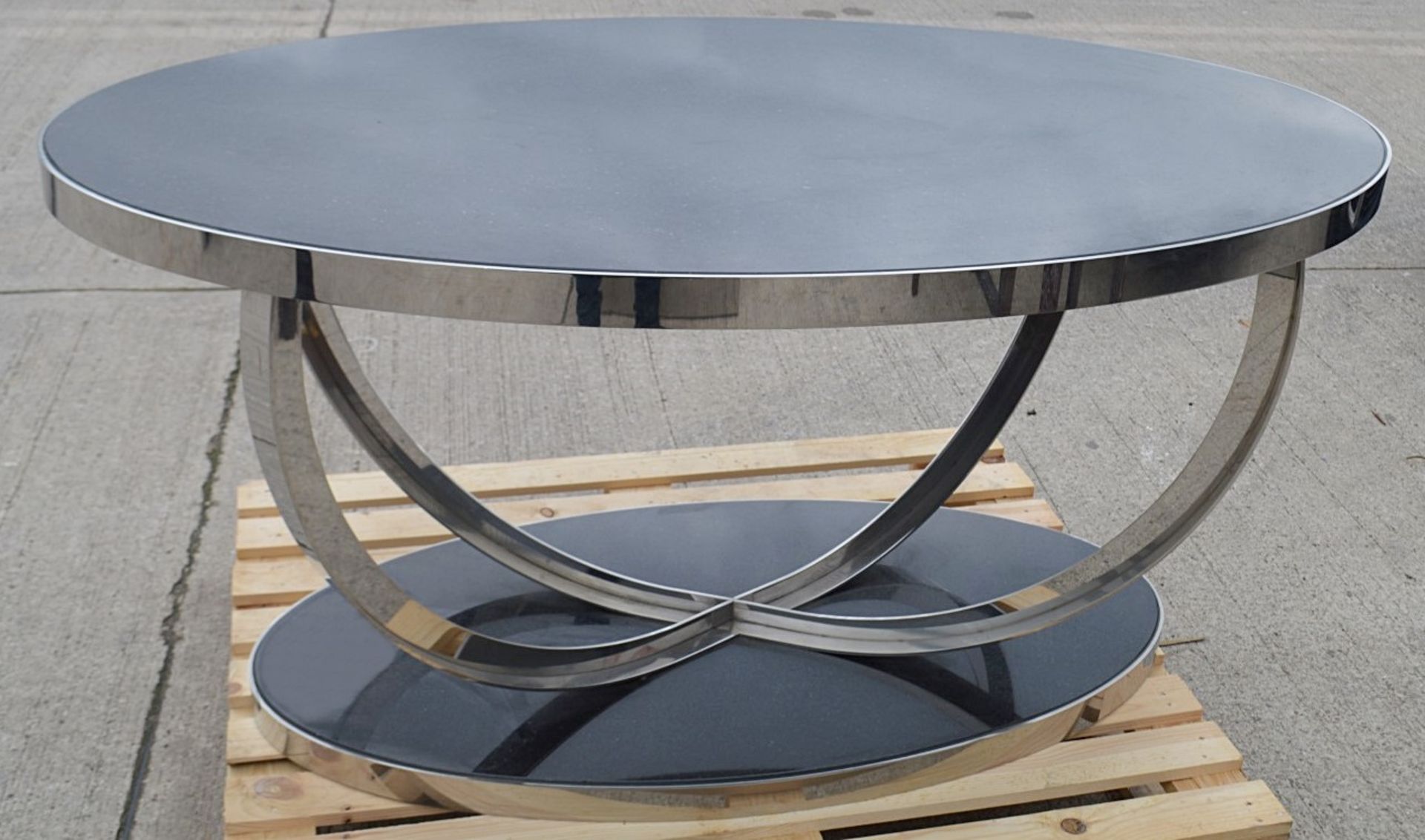 1 x Stunning 1.5 Metre Metal Oval Table With A Granite Style Surface And Sculptural Cross Base
