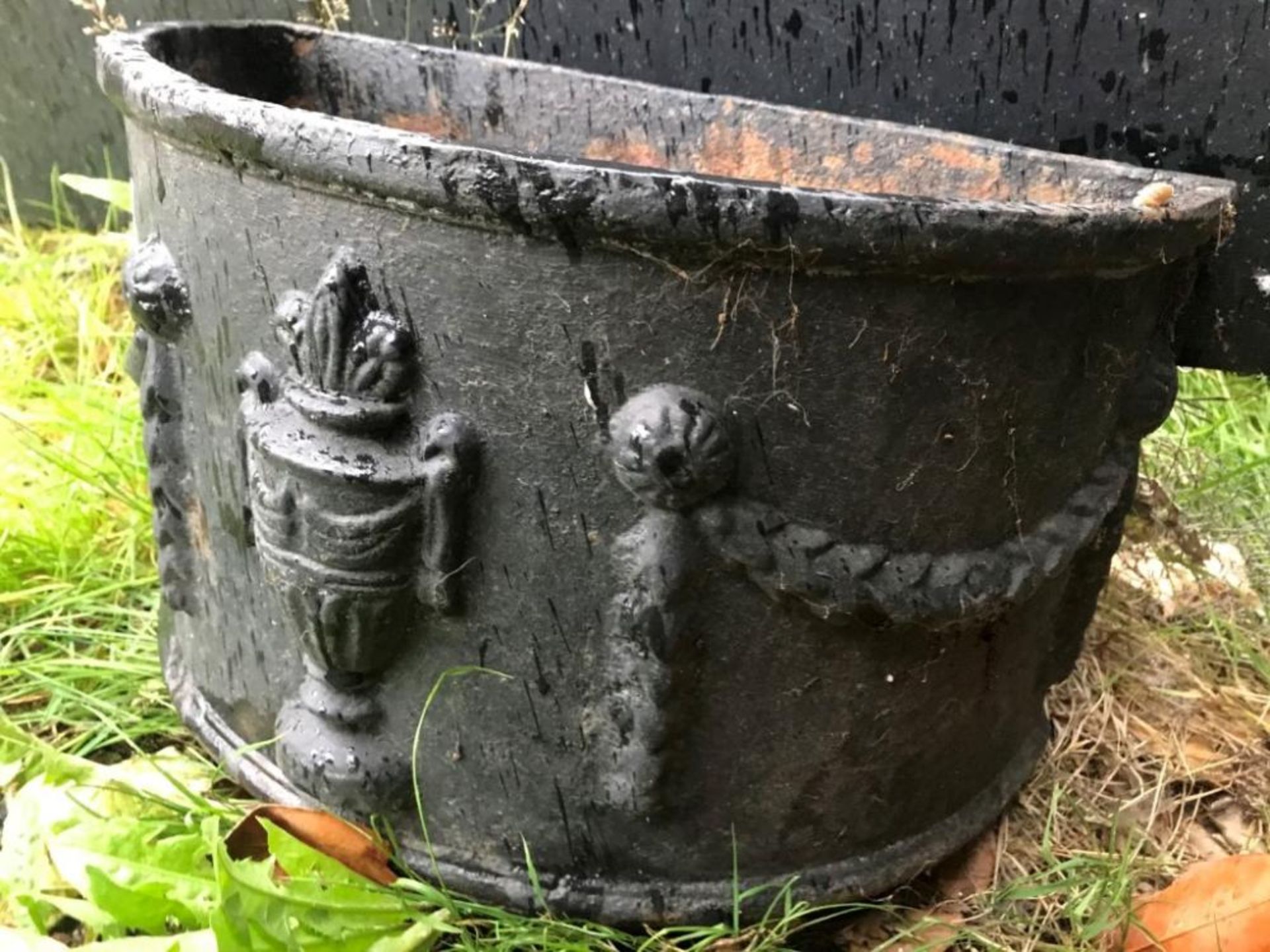 1 x Period Style Semi Circular Shaped Cast Iron Planter With Raised Sculptured Rope And Urn On Front