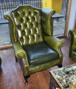 1 x Chesterfield Style Wingback Armchair In Antique Green Leather With Queen Anne Legs