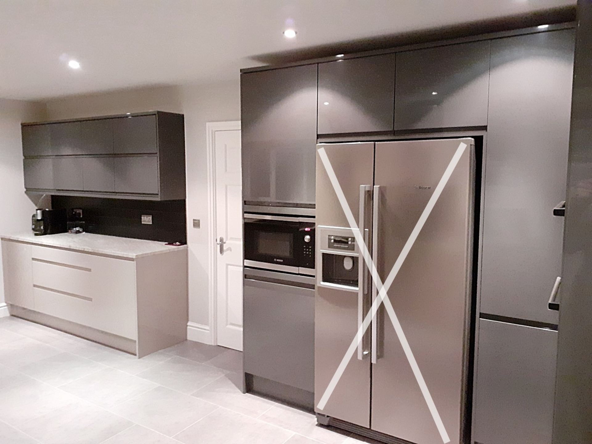 1 x Fitted Kitchen With A Sleek Handleless Design, Integrated Bosch Appliances + Granite Worktops - Image 6 of 69